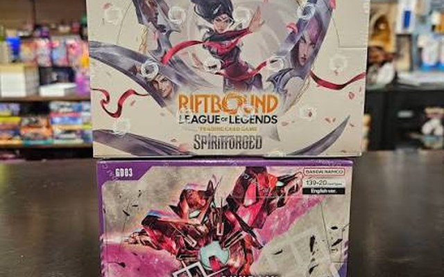 Riftbound and Gundam sealed booster boxes
